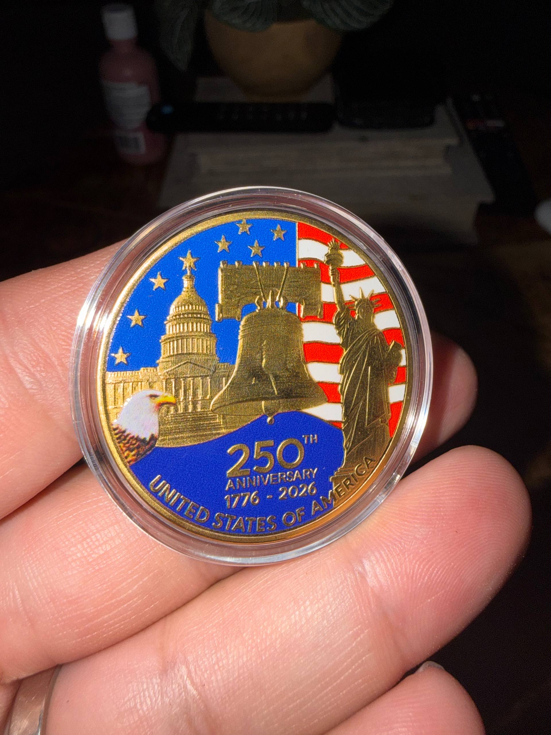America 250 Challenge Coin held in hand