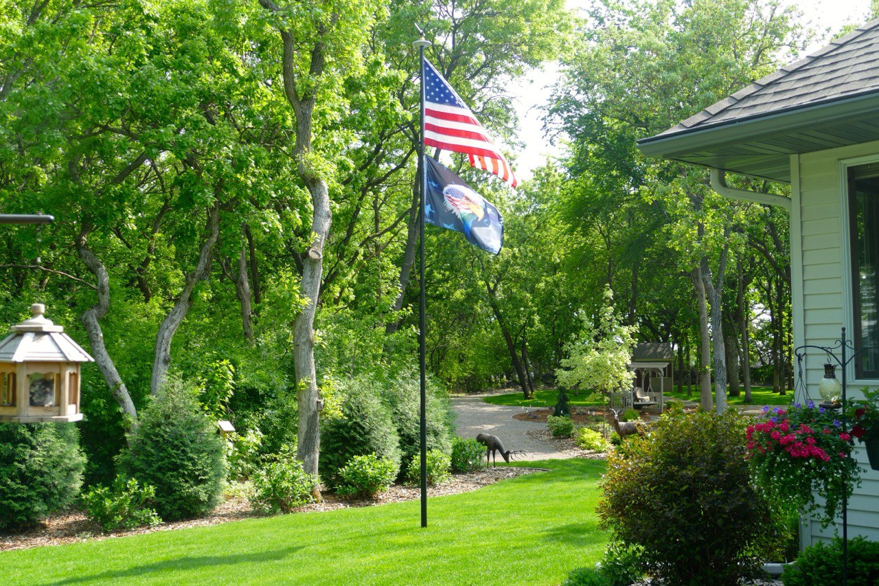 Real Phoenix flagpole installation at a customer home